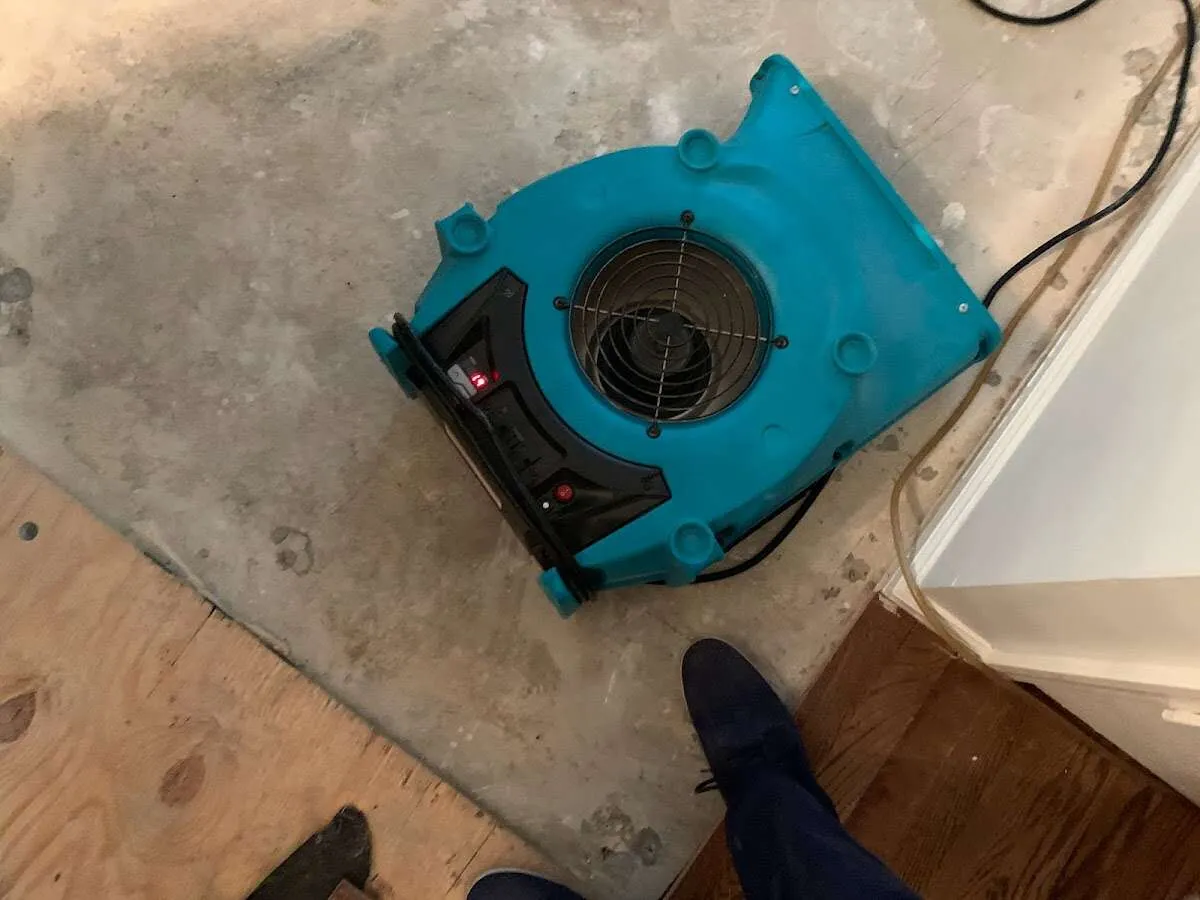 Air mover drying subfloor during Leak Detection & Repair in Gresham Park
